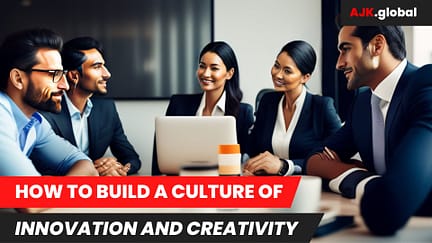 How_To_Build_A_Culture_Of_Innovation How to build a culture of innovation - four professionals sitting around a table discussing how to build a culture of innovation.